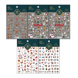 Five-pack Christmas nail art stickers featuring Santa, snowman, and gingerbread man patterns