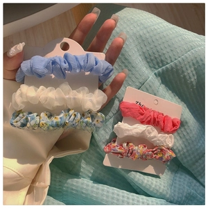 Spring floral hair scrunchies set, 3 pieces per pack, stylish hair ties and accessories.