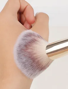 Close-up of soft synthetic fibers on a professional makeup brush for seamless makeup application