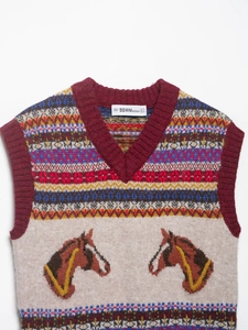 Detail of V-neck knit vest featuring vintage horse pattern and colorful jacquard textures