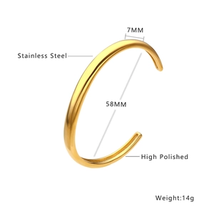 Polished gold stainless steel open bangle with 7mm width and star pattern detail