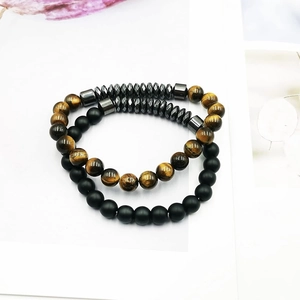 Set of 6mm tiger eye and matte black agate beaded elastic bracelets with metal accents