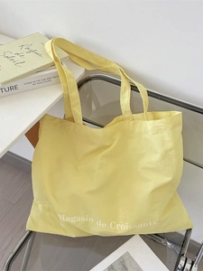 Large capacity canvas tote bag in light yellow with minimalist French style print