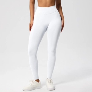 Close-up of white high-waisted seamless yoga leggings with breathable fabric texture