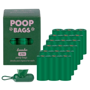 Detailed view of 18 rolls of green biodegradable pet poop bags with dispenser and box.