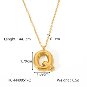 Detailed view of gold puff bubble Q letter pendant with dimensions and weight specs