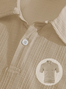 Close-up of khaki polo shirt fabric texture with vertical stripes and small squares