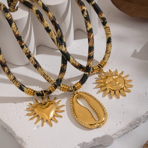 Stainless steel leopard print cord necklaces with golden heart, shell, and sun pendants