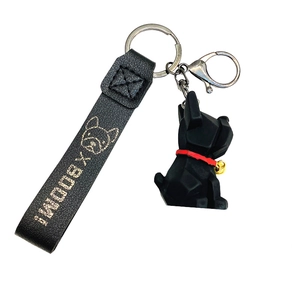 Porte-clés bouledogue géométrique avec lanière en cuir noir et texte I BOOM doré