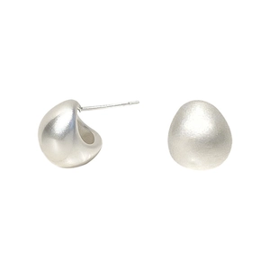 Minimalist matte silver pebble stud earrings with brushed metal texture on white background