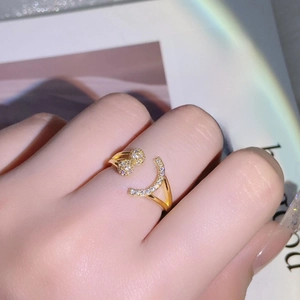 Adjustable gold smiley open ring with diamond inlay worn on finger for fashion