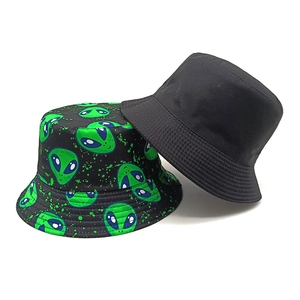 Dual-style bucket hats featuring alien print and solid black cotton with reinforced stitching