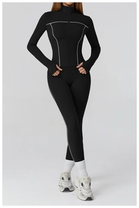 Detail of high-waist yoga leggings and zip jacket with white contrast piping and thumbholes
