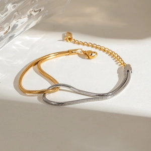 Two-tone gold and silver stainless steel snake chain bracelet with adjustable lobster clasp
