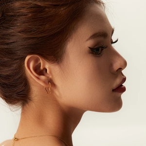 Minimalist 18K gold stainless steel heart earrings and necklace set on model