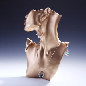 Resin bust jewelry stand with blue gemstone necklace, earrings and bangles set