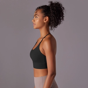 Side view of high-support black sports bra and lilac yoga leggings with slim fit design