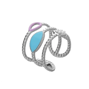 Macro view of multi-layer silver ring with purple and blue enamel details and micro-bead texture