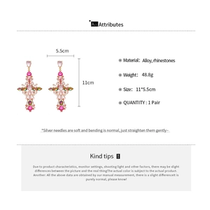Detailed size chart of vintage court-style crystal cross earrings with silver needles