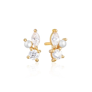 Detail of gold stud earring featuring elegant cluster of white pearl and zircon stones