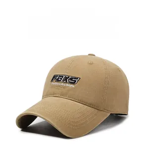 Detail view of khaki cotton baseball cap featuring high-quality 3D FBXS embroidery