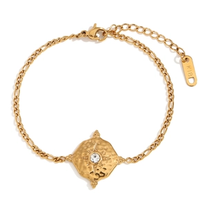 18K gold-plated stainless steel bracelet with a vintage starburst pendant and gemstone