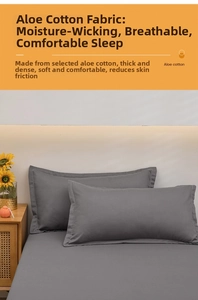 Macro detail of dark grey aloe cotton pillowcase showing soft fabric and fine stitching