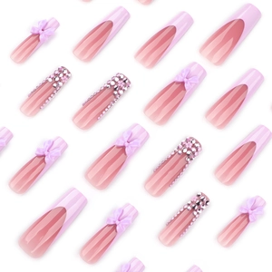 Long square pink and purple press-on nails with sparkling rhinestones and butterfly charms