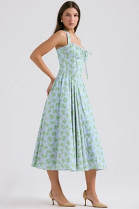 Detail of light blue floral dress showing halter neck design and drawstring bow decoration