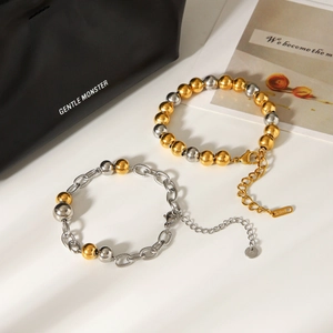 Bracelets bicolores en acier inoxydable avec perles or et argent pour femmes au style minimaliste