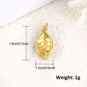 Macro view of 18k gold plated leaf pendant with detailed veins and size dimensions