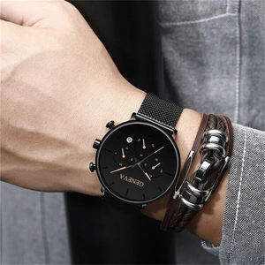 Detail of Geneva black quartz watch with mesh strap and leather braided bracelets