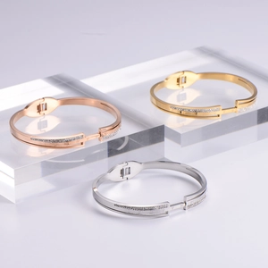Three-color roman numeral stretch bracelets with crystals on acrylic display blocks