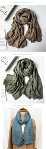 Detailed views of striped scarves in brown green and blue with elegant fringe edges