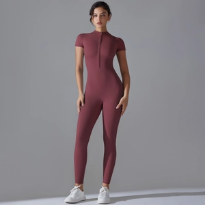 Detail of the high-stretch yoga jumpsuit featuring a front zipper and stand collar