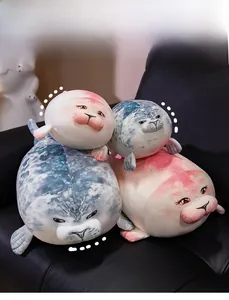 Stack of soft plush seal dolls in grey and pink colors across four different sizes