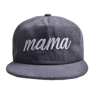 Detail of high-quality corduroy texture and 3D white Mama embroidery on charcoal grey cap