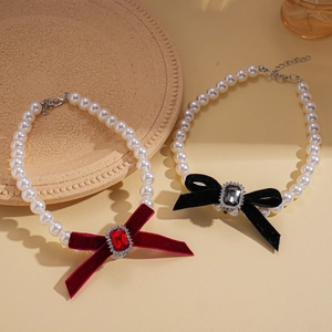 Elegant pearl necklaces with red and black velvet bows and square crystal pendants