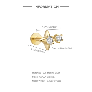 Macro shot of gold plated 925 silver star stud earrings with AAAAA cubic zirconia stones
