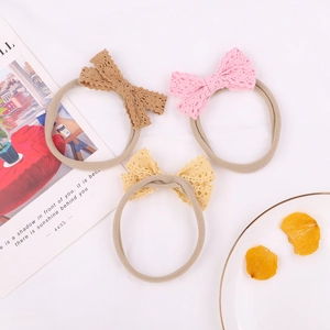Three-pack of baby nylon headbands with lace bows in brown, pink and yellow shades