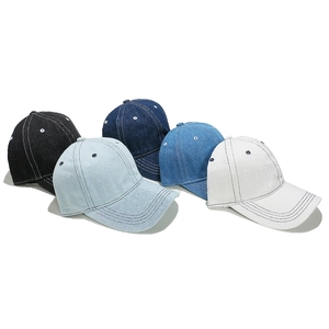 Classic washed denim baseball caps in five colors including blue, black, and white