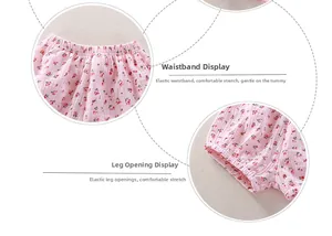Detail of pink floral cotton shorts featuring elastic waist and ruffled leg openings