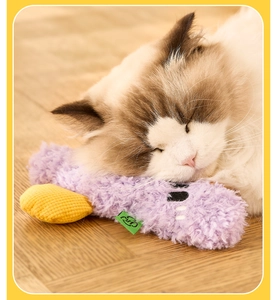 Macro detail of plush pet pillow toy showing soft faux fur texture and Ragdoll cat sleeping