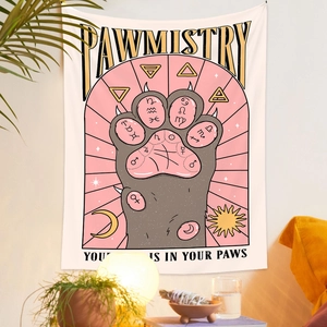 Detail of Pawmistry tapestry showing sun and moon symbols with Your Future is in Your Paws text