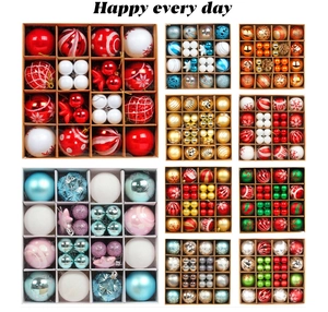 Detail showing assorted multi-color Christmas tree ball ornaments in boxed gift sets
