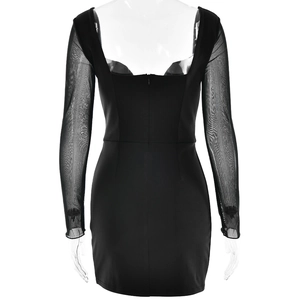 Detail view of the open back dress featuring sheer mesh sleeves and hidden back zipper