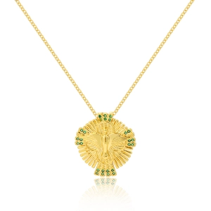 Macro shot of 18K gold plated pigeon pendant with green gemstones and ray details