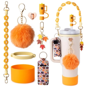 Autumn-themed orange silicone cup boot, floral straw cover, and maple leaf charms set