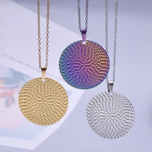 Minimalist stainless steel necklaces with textured round pendants in gold, silver, and rainbow