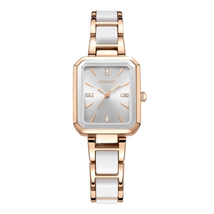 Detail view of square rose gold watch with white ceramic links and diamond markers